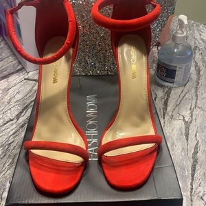 Red Heels(Fashion Nova) Size 9. Worn twice.